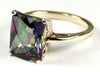 R054, 7ct Mystic Fire Topaz set in a Gold Ring