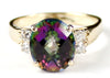 R123, 4.5ct Mystic Fire Topaz set in a Gold Ring w/ 4 cz accents