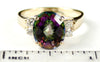 R123, 4.5ct Mystic Fire Topaz set in a Gold Ring w/ 4 cz accents