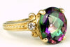 R136, 4.5ct Mystic Fire Topaz set in a Gold Ring with CZ accents
