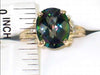 R136, 4.5ct Mystic Fire Topaz set in a Gold Ring with CZ accents