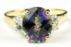 R244, 6ct Mystic Fire Topaz set in a Gold Ring w/ 4 cz accents