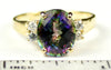R244, 6ct Mystic Fire Topaz set in a Gold Ring w/ 4 cz accents
