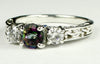 SR254, 1ct round Mystic Fire Topaz set in a Sterling SIlver Engagement Ring w/ 2 4mm CZ Accents