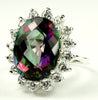 SR310, 12ct Mystic Fire Topaz set in a large Sterling SIlver Ring w/ 16 CZ Accents