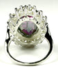 SR310, 12ct Mystic Fire Topaz set in a large Sterling SIlver Ring w/ 16 CZ Accents